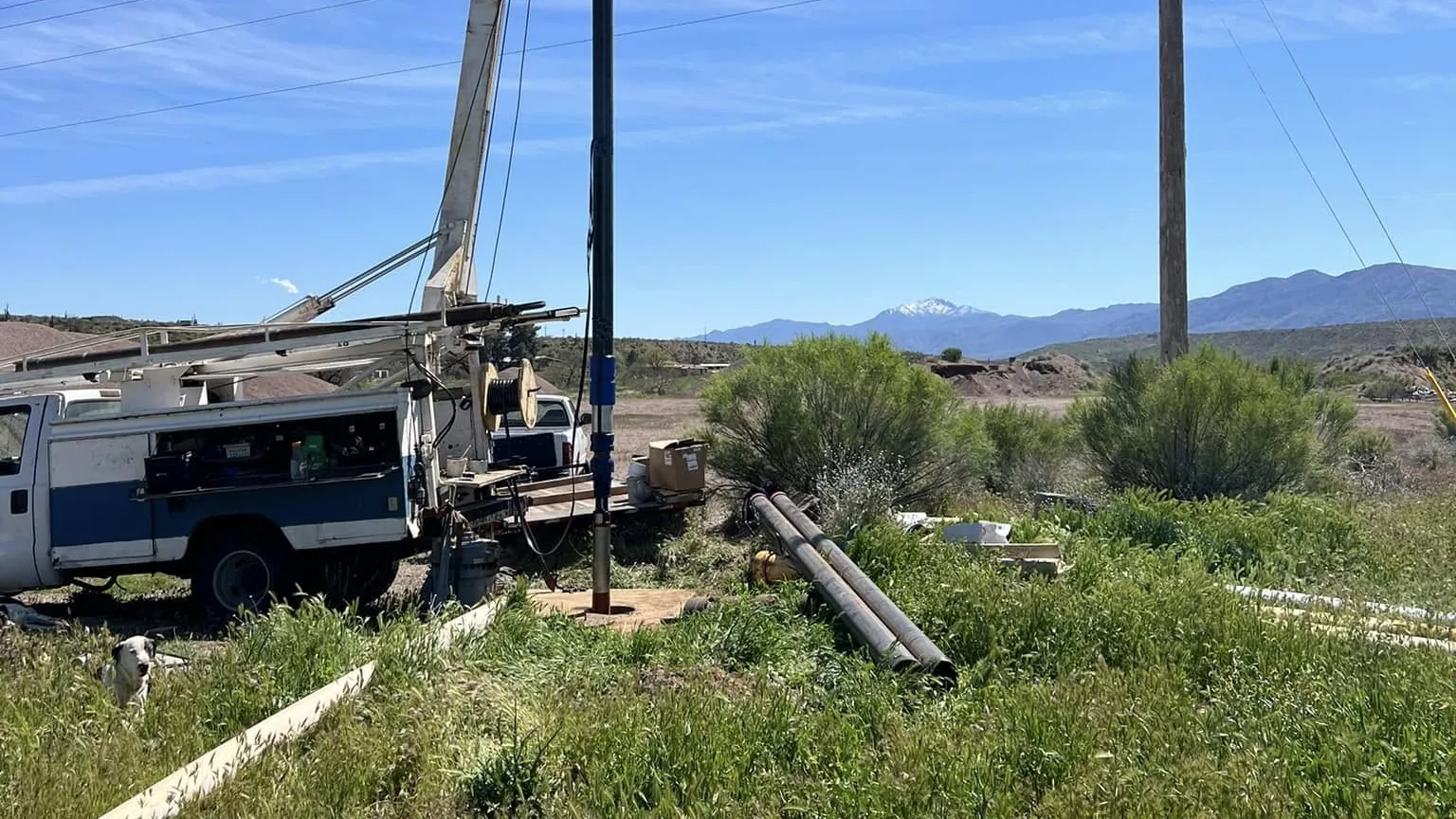 Pump hoist truck set up over an irrigation well in Tonto Basin, Arizona