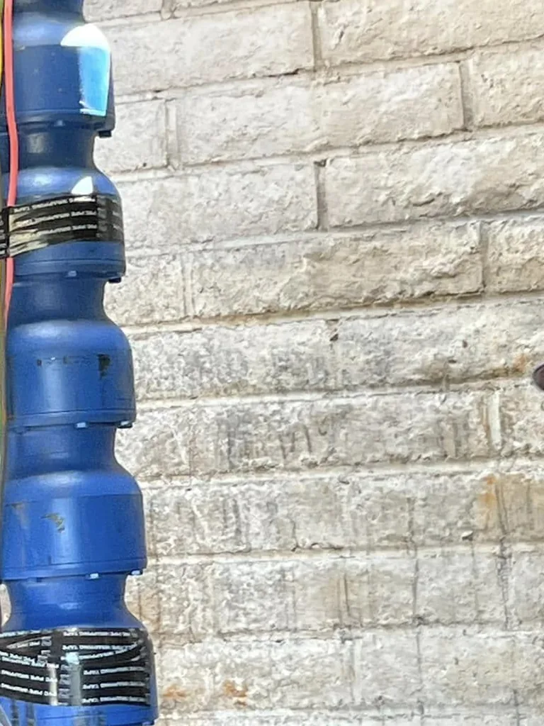 New submersible well pump with the drop cable taped along the pump body